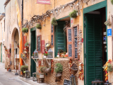 Original source: https://media.fshoq.com/images/408/spanish-street-shops-and-restaurants-408-small.jpg Beginning Conversational Spanish