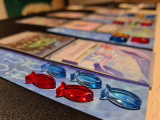 Original source: https://upload.wikimedia.org/wikipedia/commons/d/df/Fish_tokens_in_board_game_Oceans.jpg Board Games - Tuesday